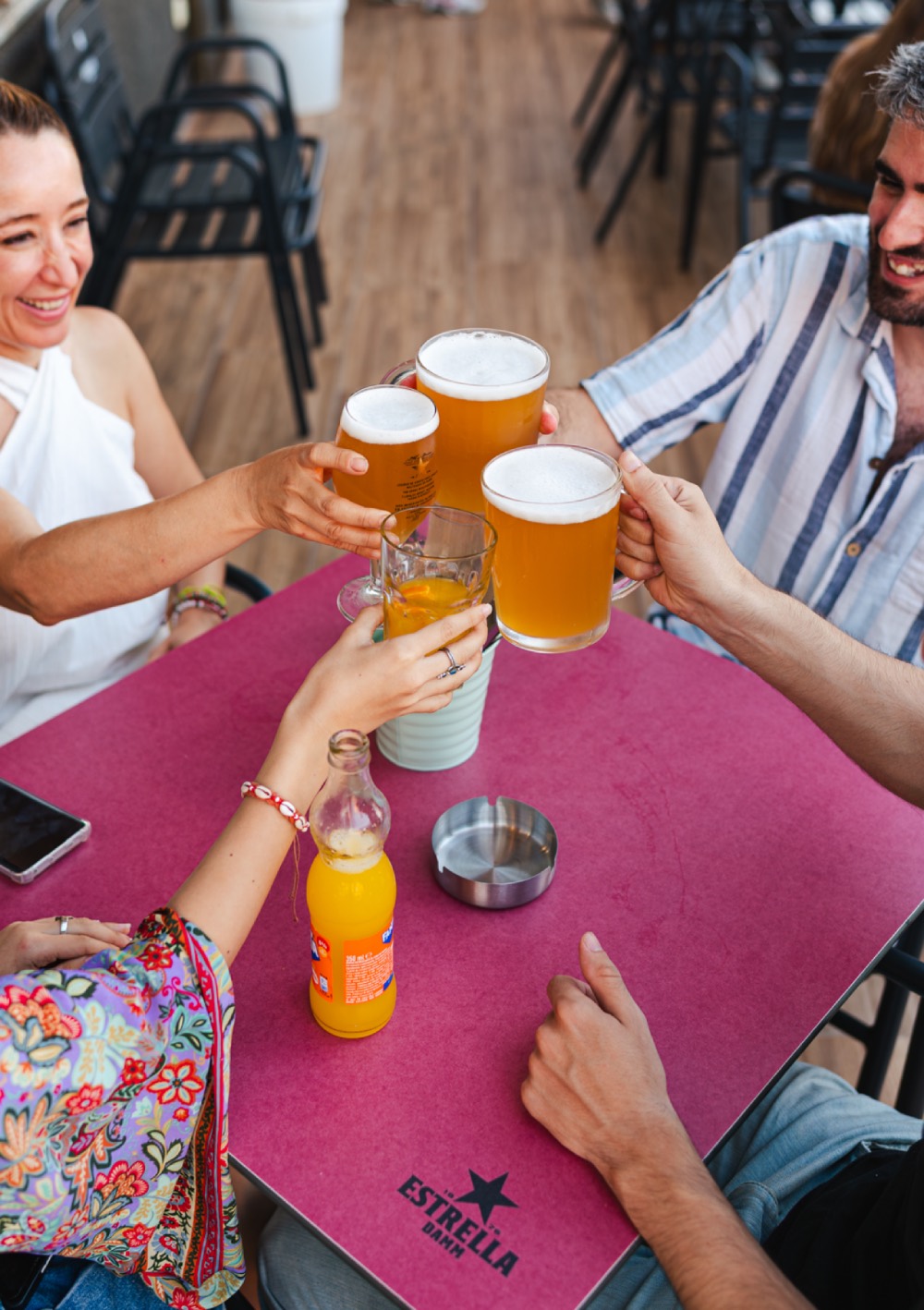 Guests enjoying drinks at PAMPA Smash Burger